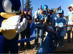 Mascot suit attends playground ceremony
