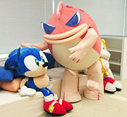 Fish Man Pets a Giant Sonic Doll
