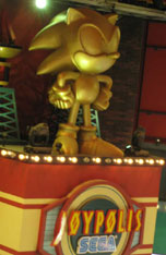 Joypolis Gold Sonic Statue on sign