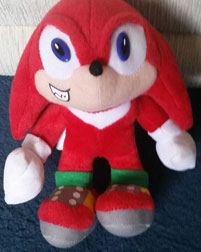 Small Suspicious Knuckles Doll