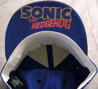 Logo under bill Sonic cap